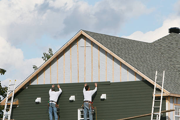 Professional Siding Installation technician working in Amherst, OH